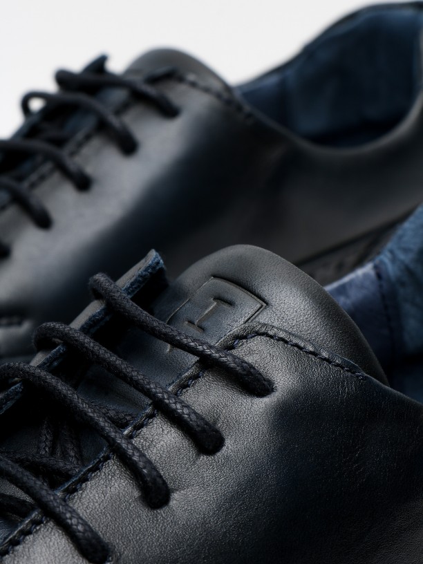 Leather sneakers with pricked detail Leather sneakers with pricked detail