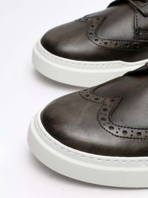 Leather sneakers with pricked detail