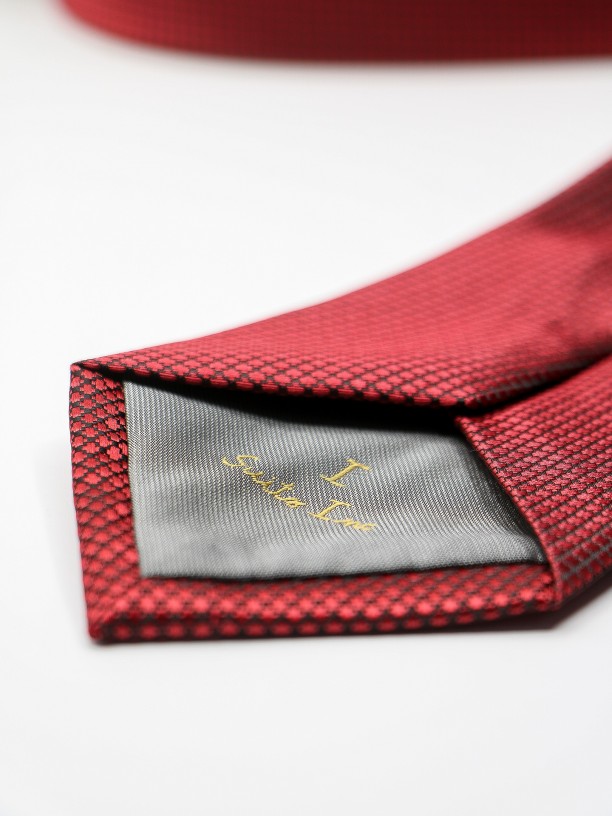 Classic tie with structured pattern
