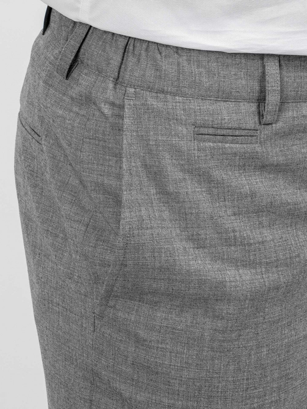 Pantalones slim fit dobladillo corto