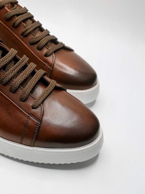 Leather sneakers with detail on heel