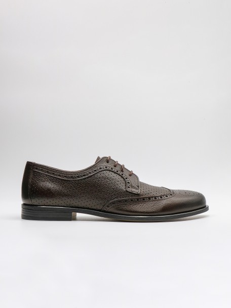 Sapato elegante picado de pele flex�vel
