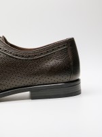 Sapato elegante picado de pele flex�vel