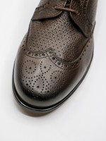 Sapato elegante picado de pele flex�vel
