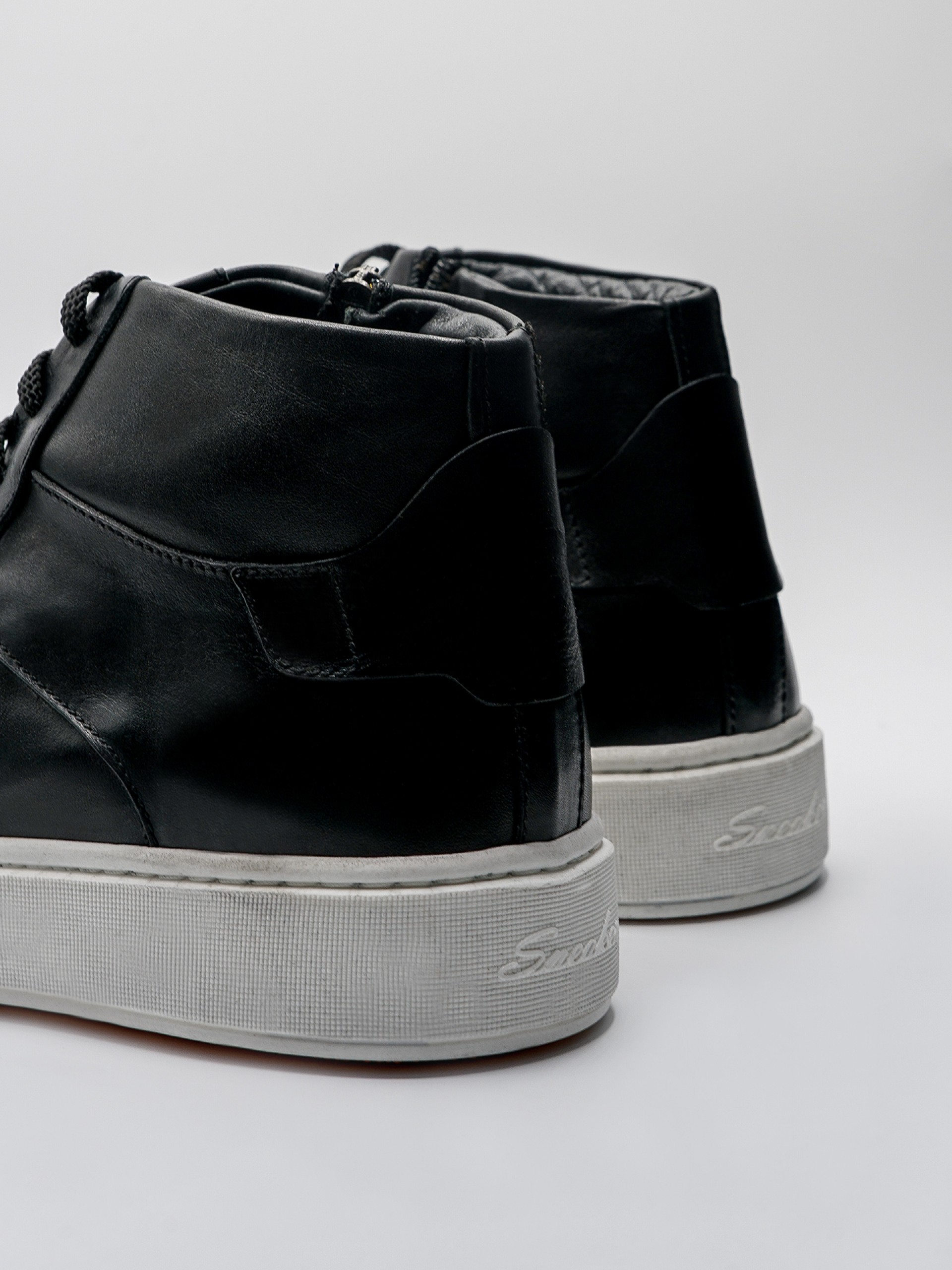 Deportivo de piel de tacón con cremallera