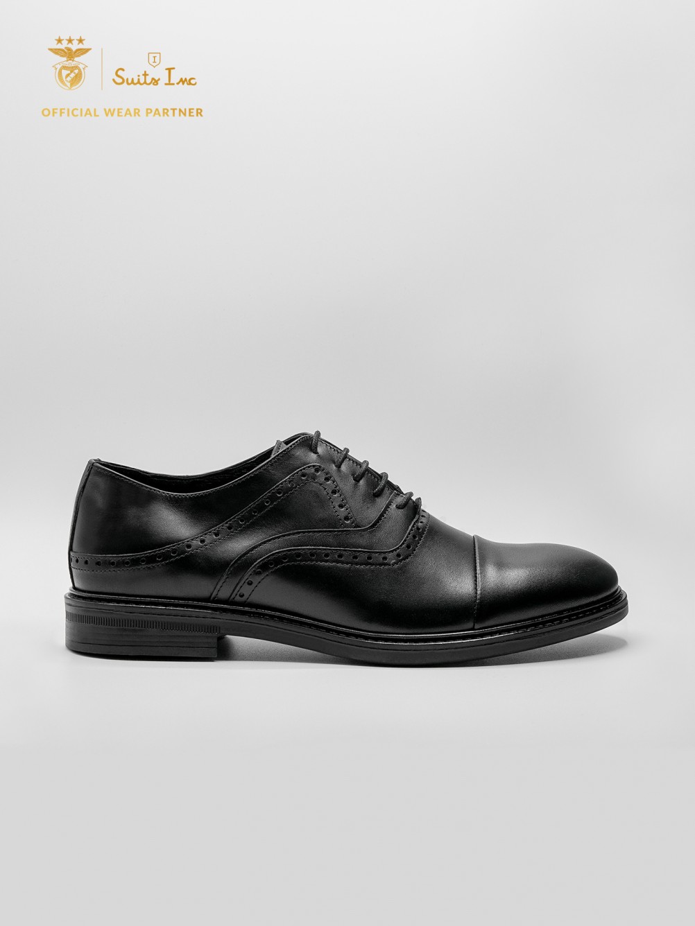 Zapato de vestir de piel picado