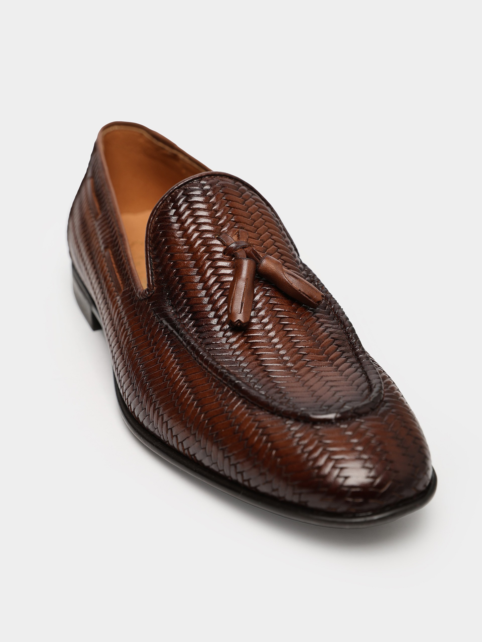 Leather moccasin with charm