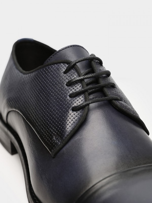 Sapato de pele com padrão Sapato de pele com padrão