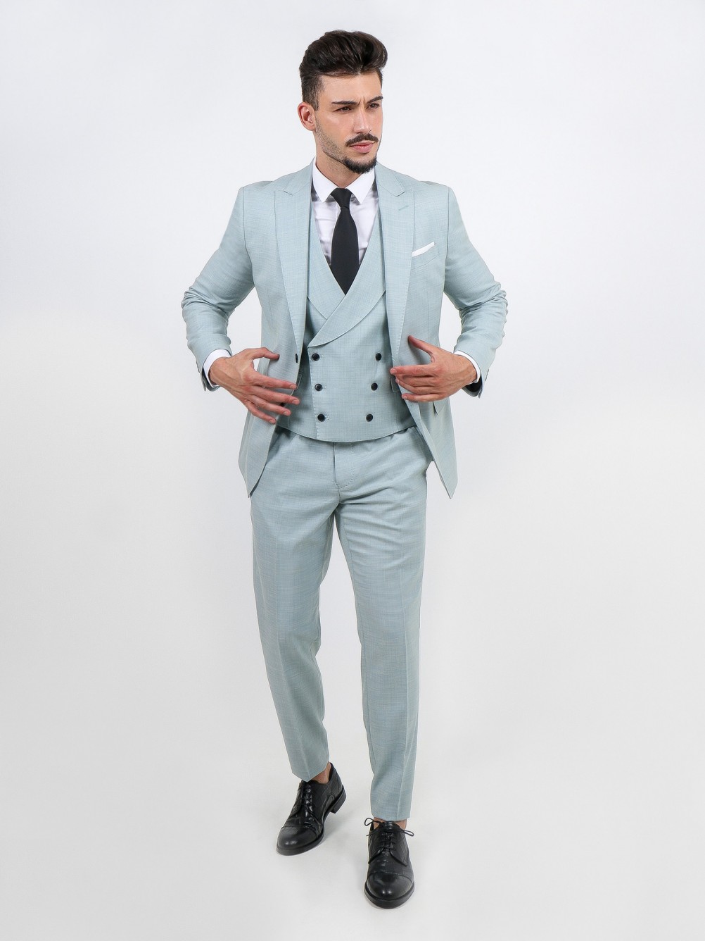 Traje liso slim fit con chaleco