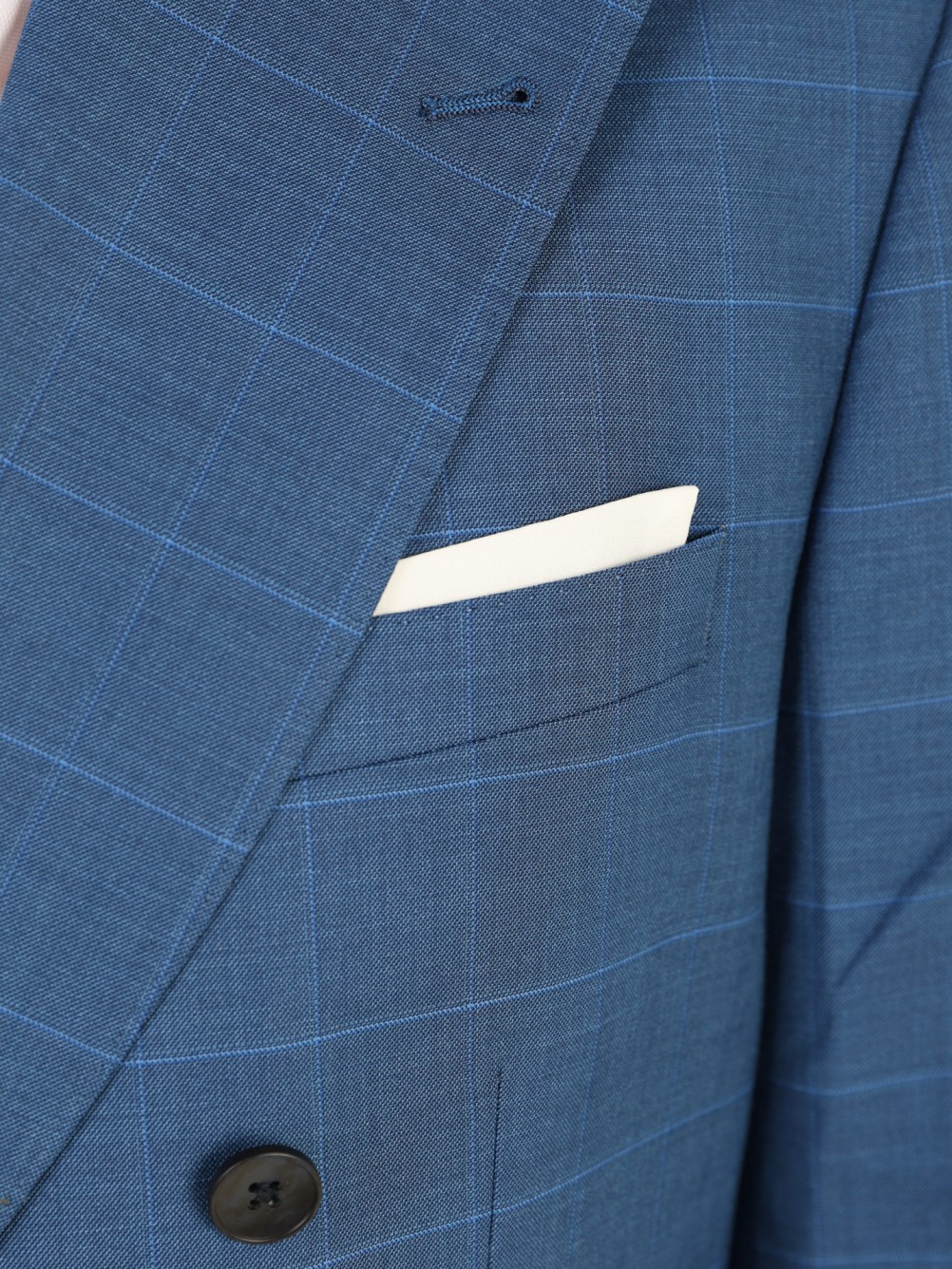 Double-breasted suit with a checkered pattern