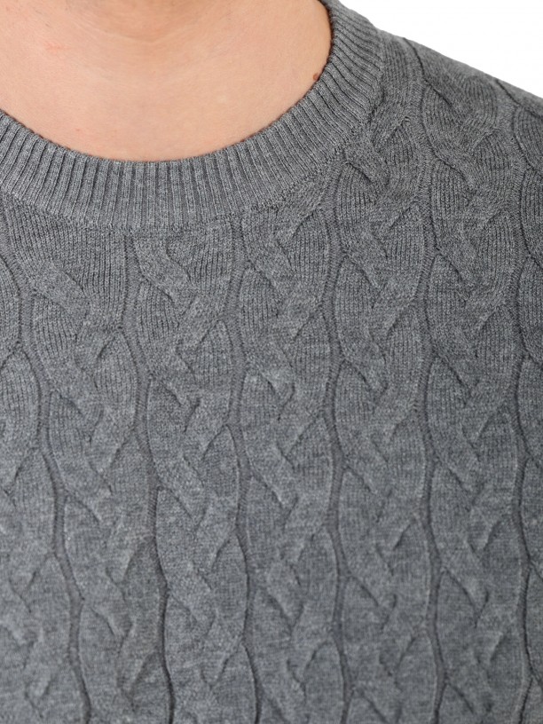 Knit sweater with a braided effect