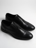 Zapato clásico liso de piel Zapato clásico liso de piel