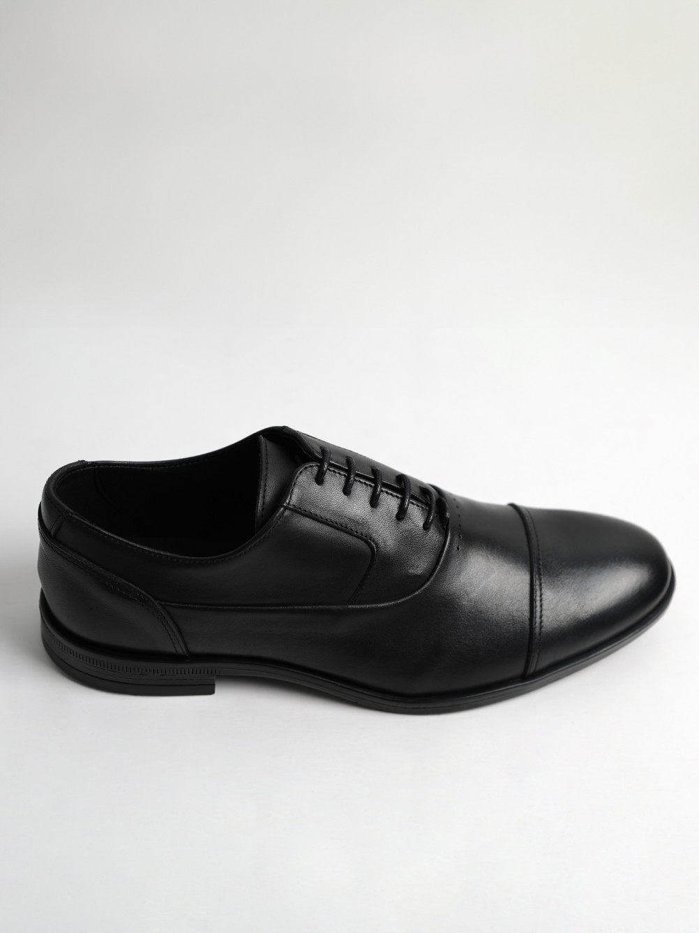 Zapato clásico liso de piel