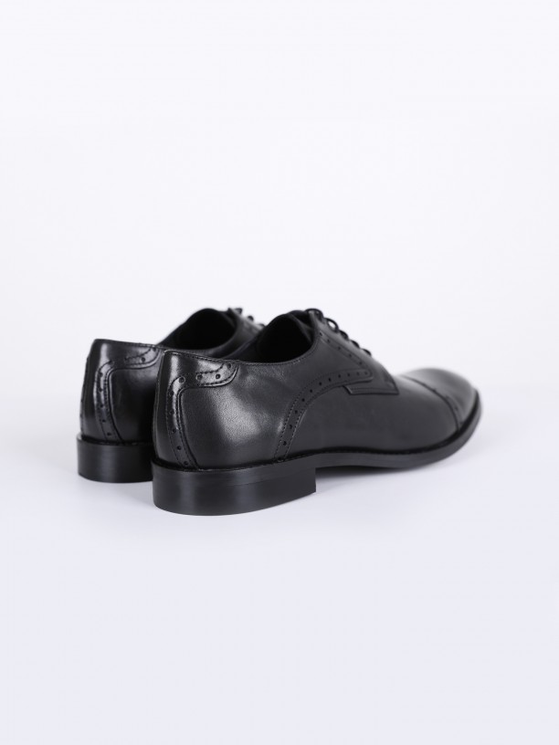 Elegant perforated leather shoe
