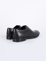 Elegant perforated leather shoe Elegant perforated leather shoe