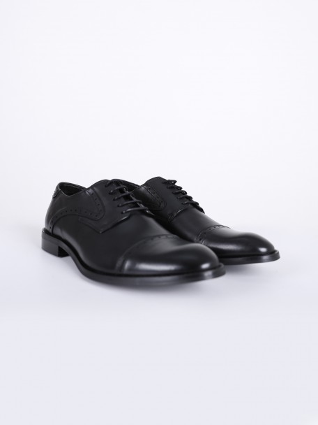 Elegant perforated leather shoe Elegant perforated leather shoe