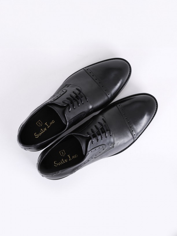 Elegant perforated leather shoe