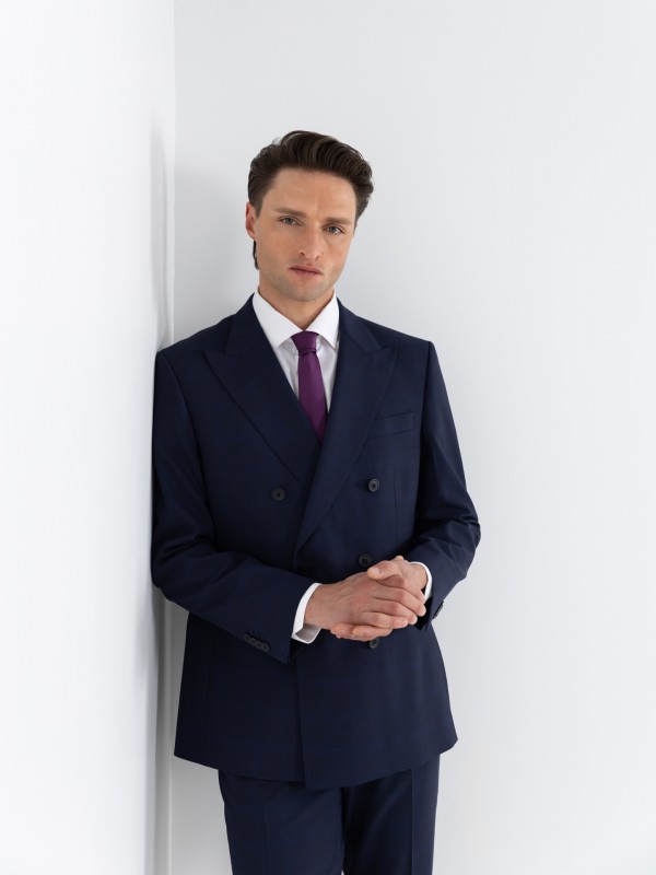 Double-breasted suit with a checkered pattern Double-breasted suit with a checkered pattern