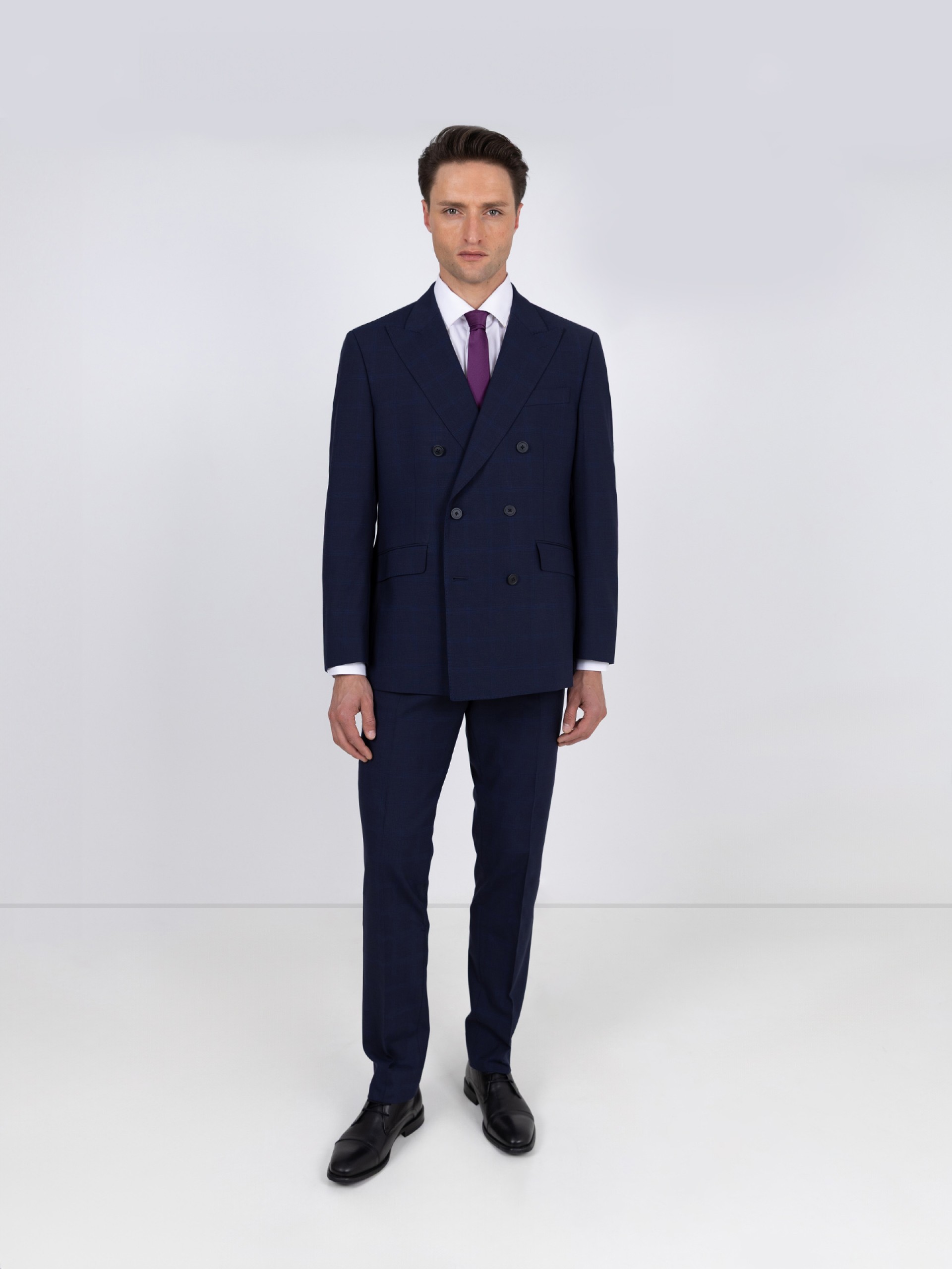 Traje cruzado de patrón a cuadros