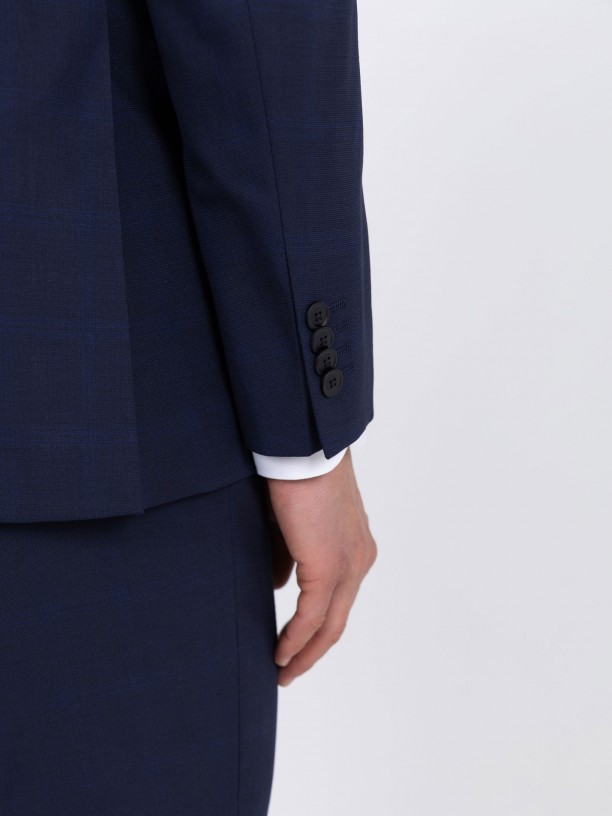Double-breasted suit with a checkered pattern Double-breasted suit with a checkered pattern