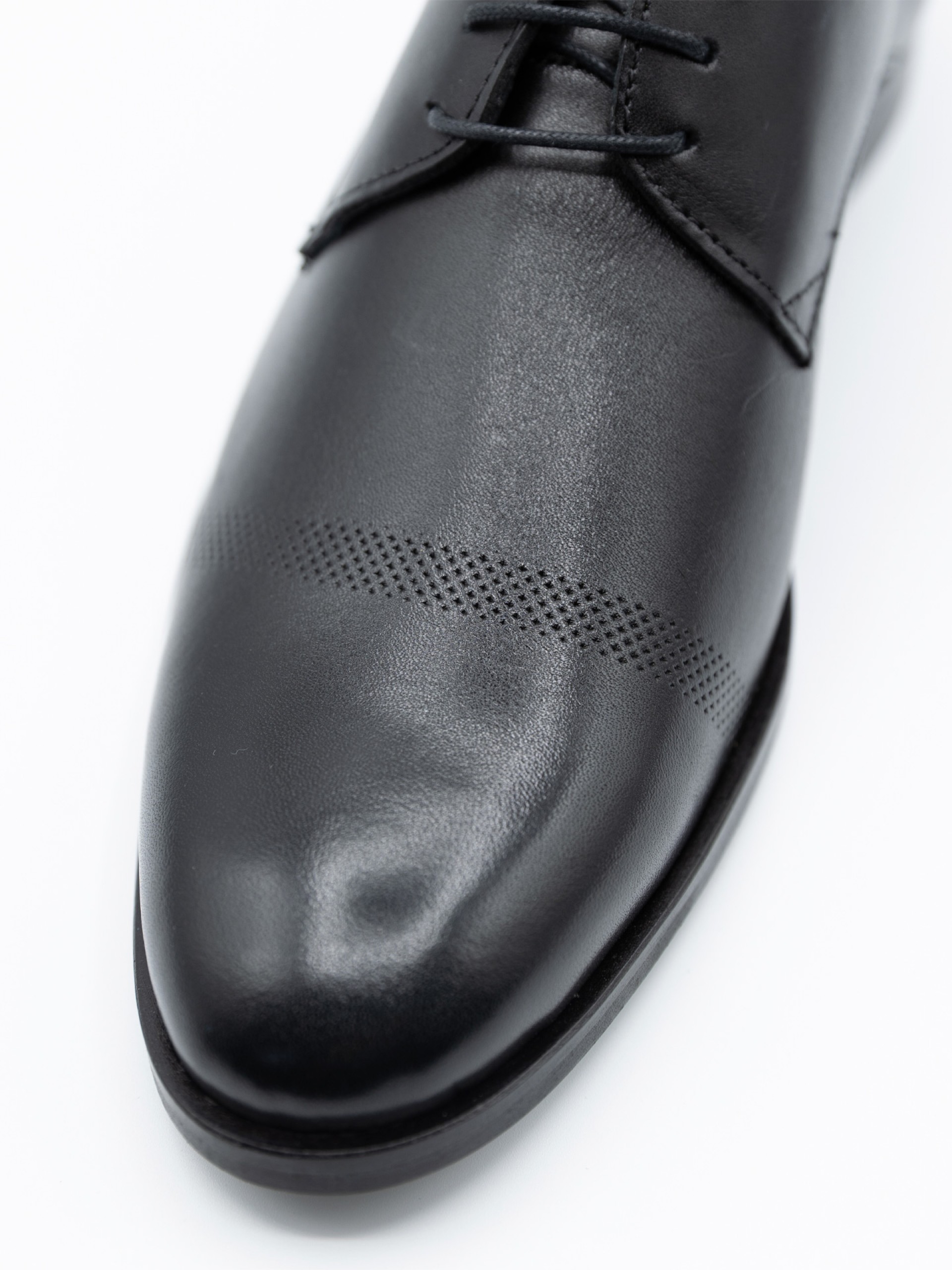 Sapato elegante de pele