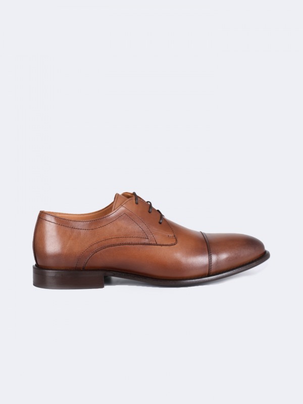 Zapato elegante de piel