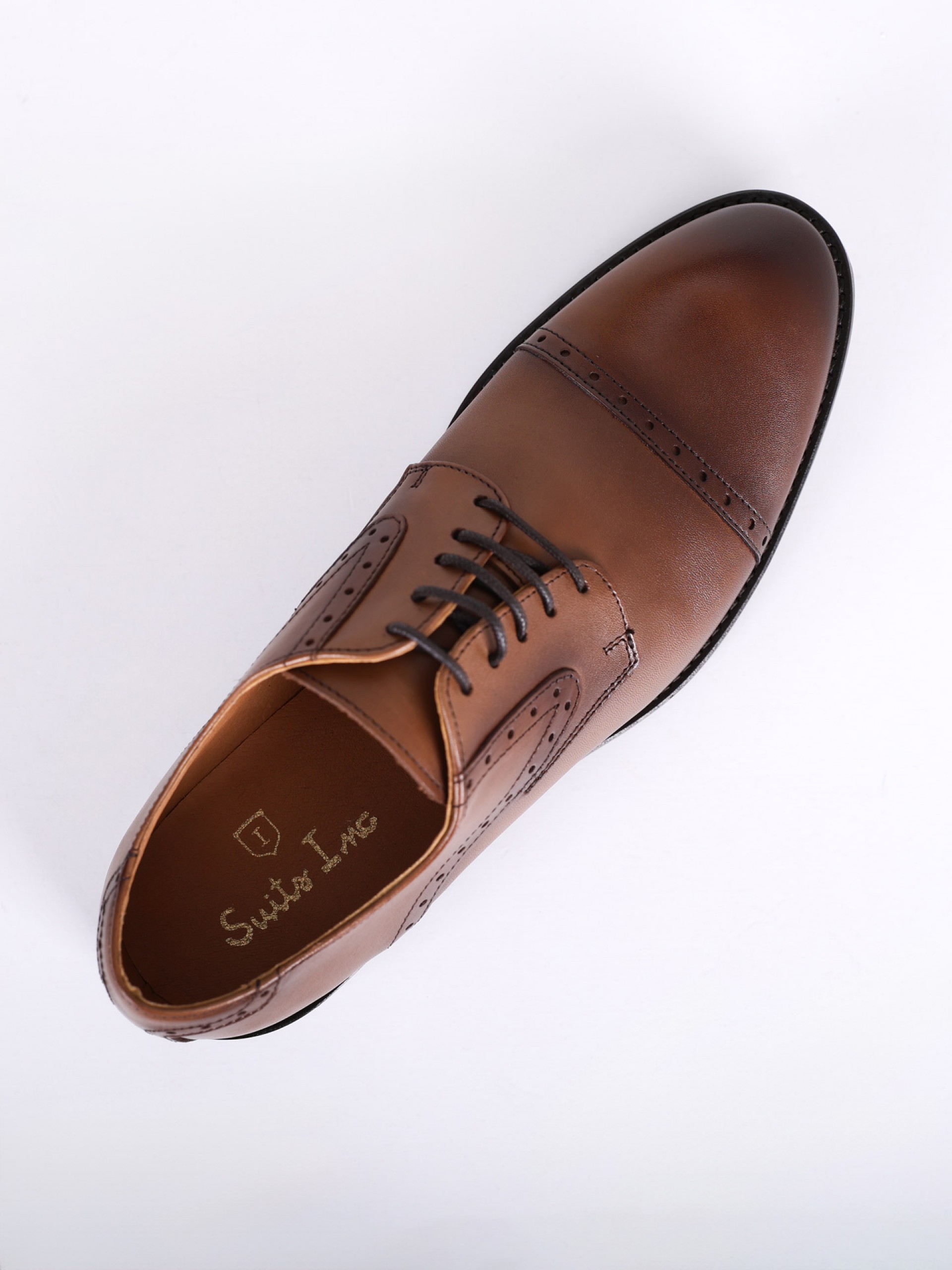 Zapato elegante de piel picada