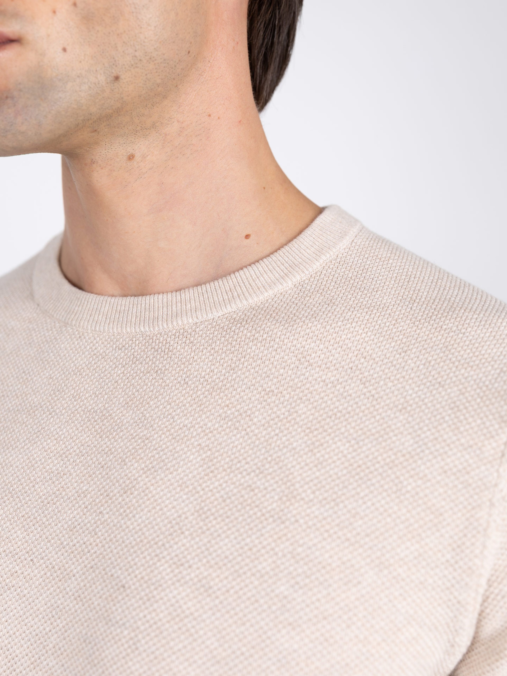 Cotton knit sweater with a round neck