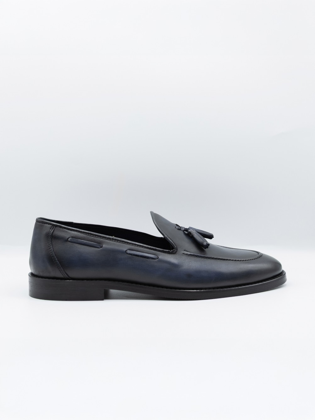 Sapato elegante de pele