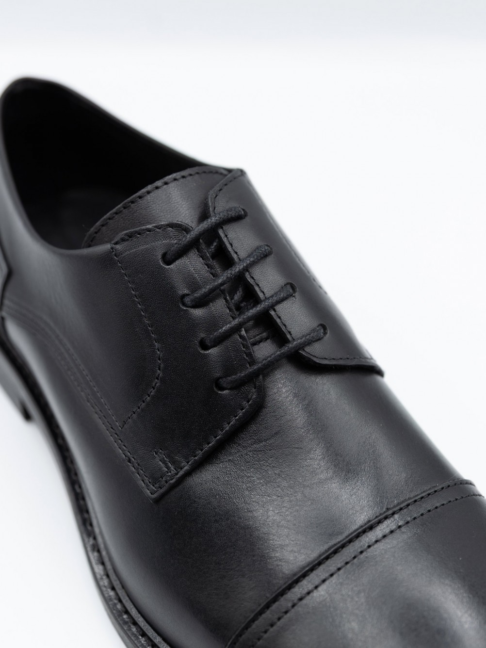 Sapato elegante de pele