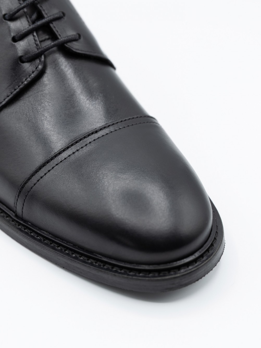 Sapato elegante de pele