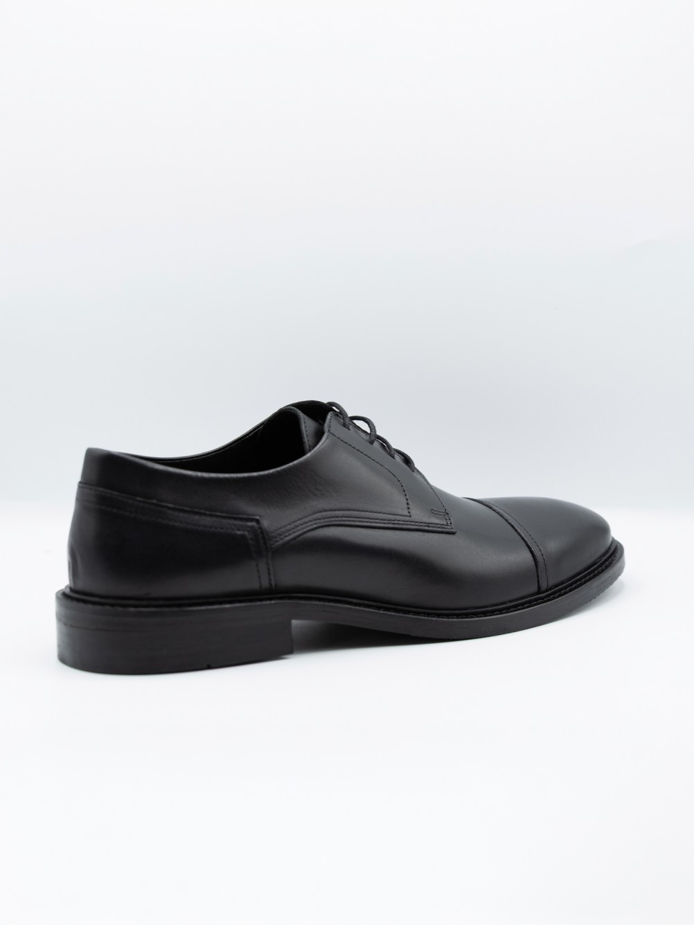 Sapato elegante de pele