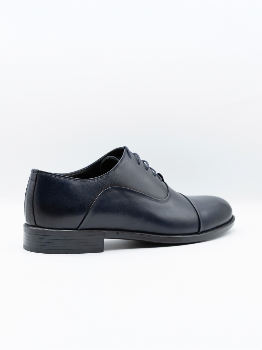 Sapato elegante de pele