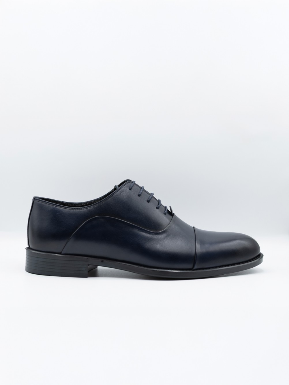 Sapato elegante de pele