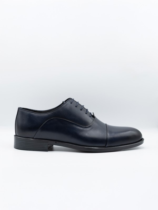 Sapato elegante de pele