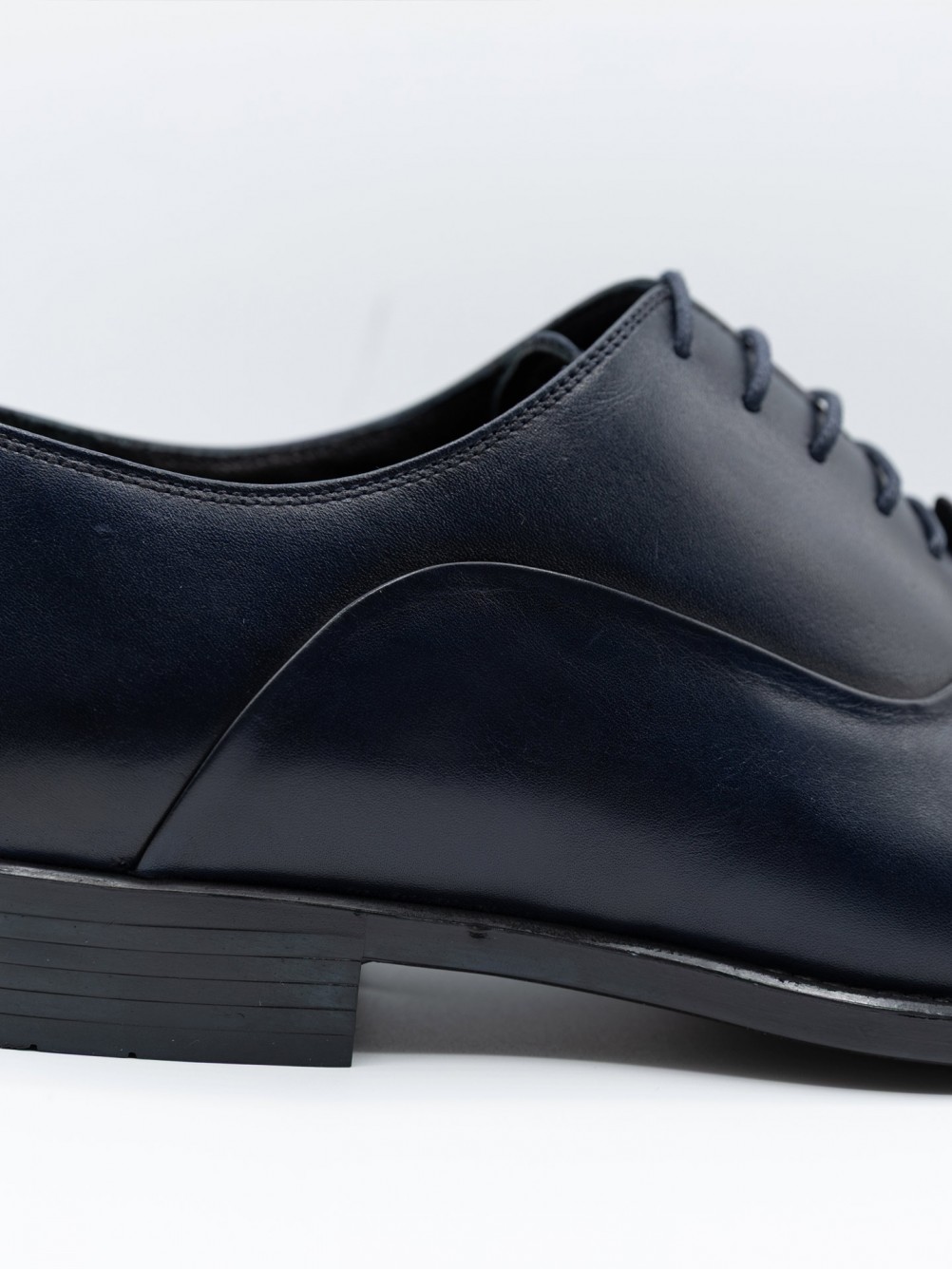 Sapato elegante de pele