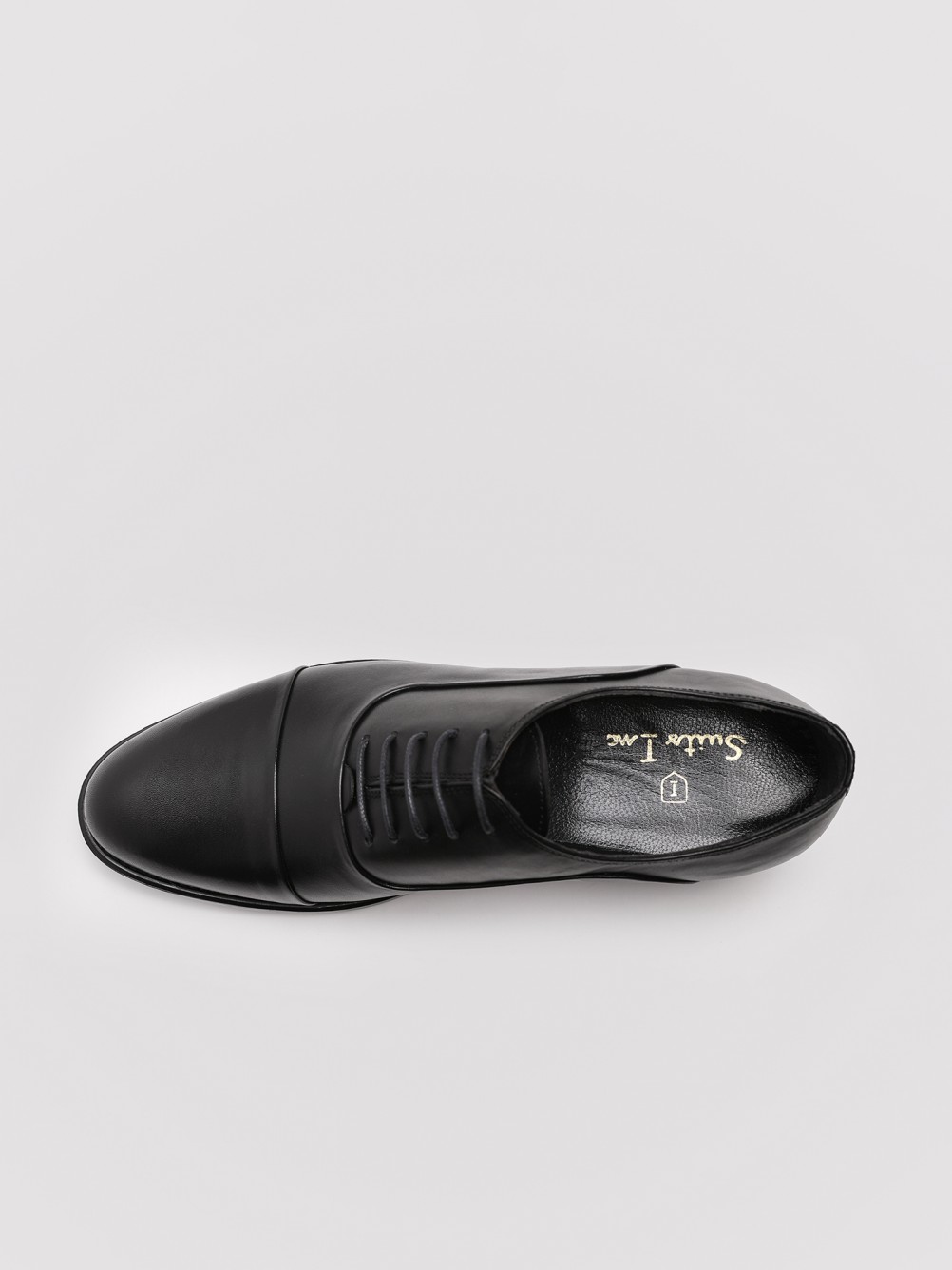 Zapato elegante de piel