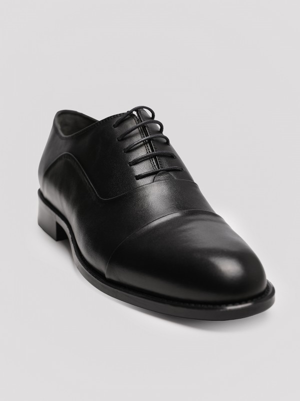 Zapato elegante de piel Zapato elegante de piel