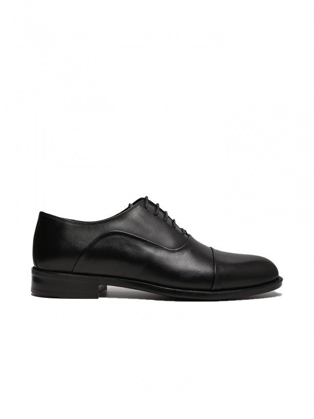 Sapato elegante de pele