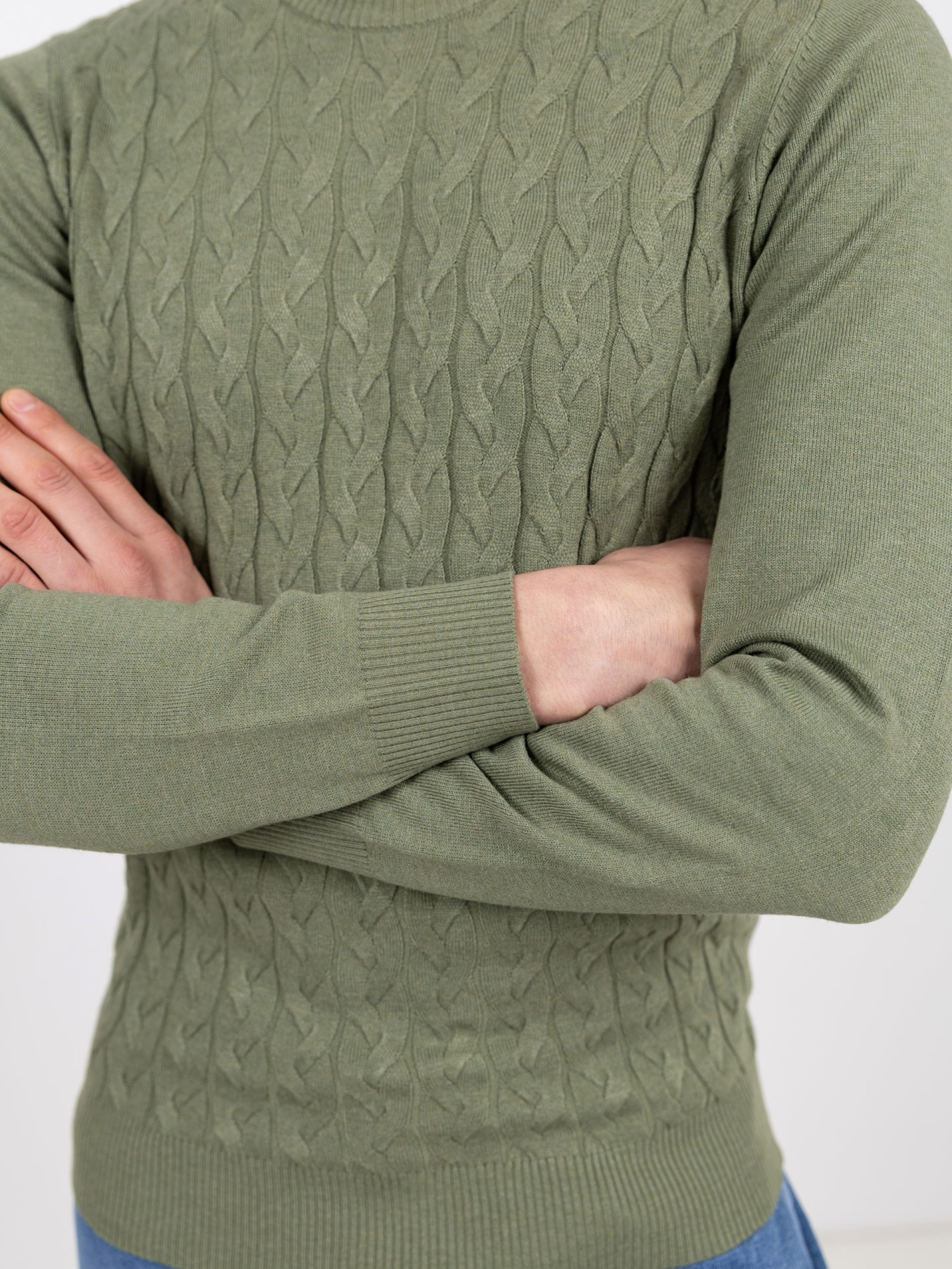 Knit sweater with a braided effect