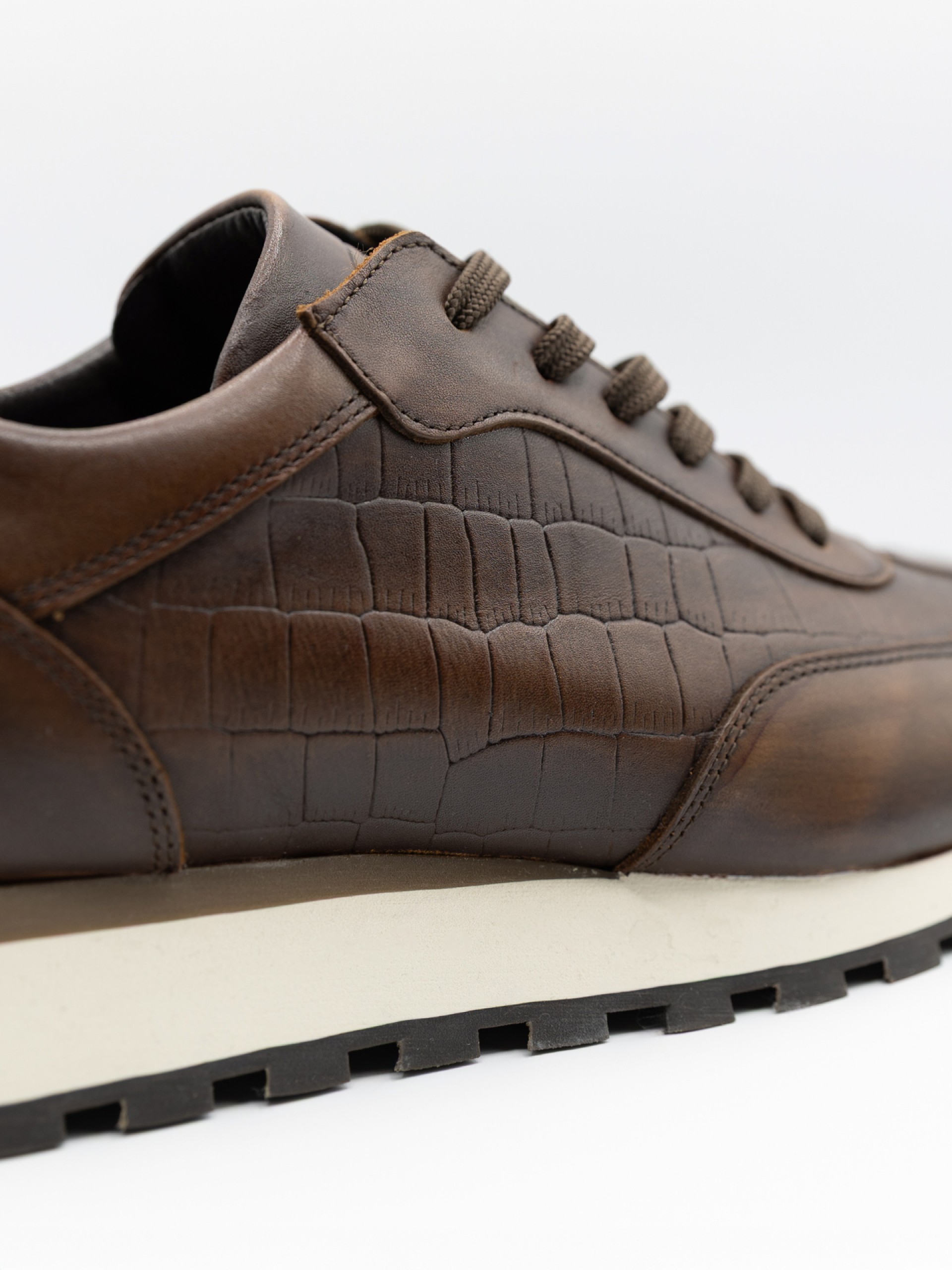 Polished leather sneaker