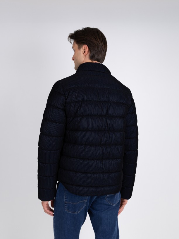 Padded jacket with a velvety touch.