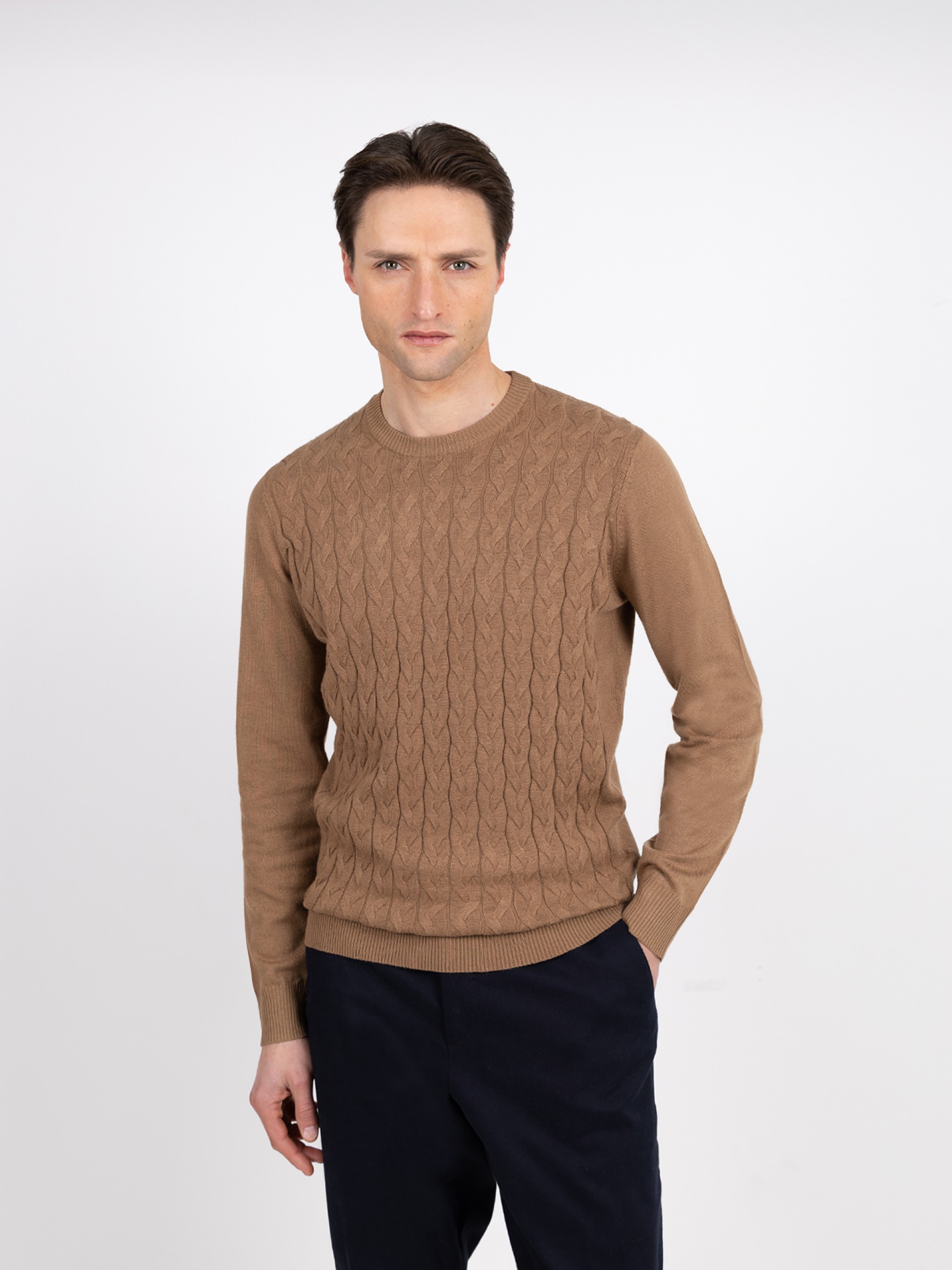 Knit sweater with a braided effect