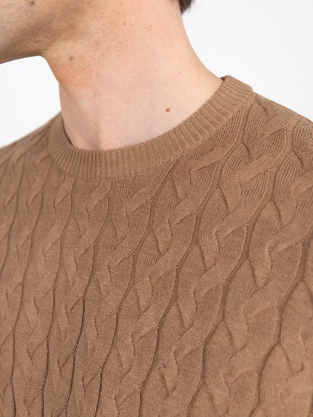 Knit sweater with a braided effect
