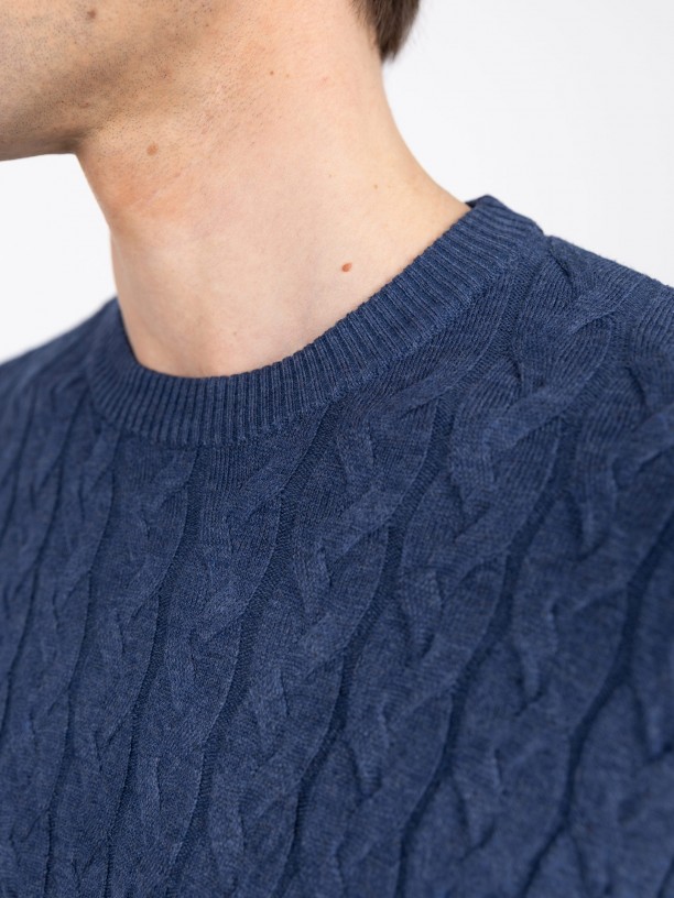 Knit sweater with a braided effect