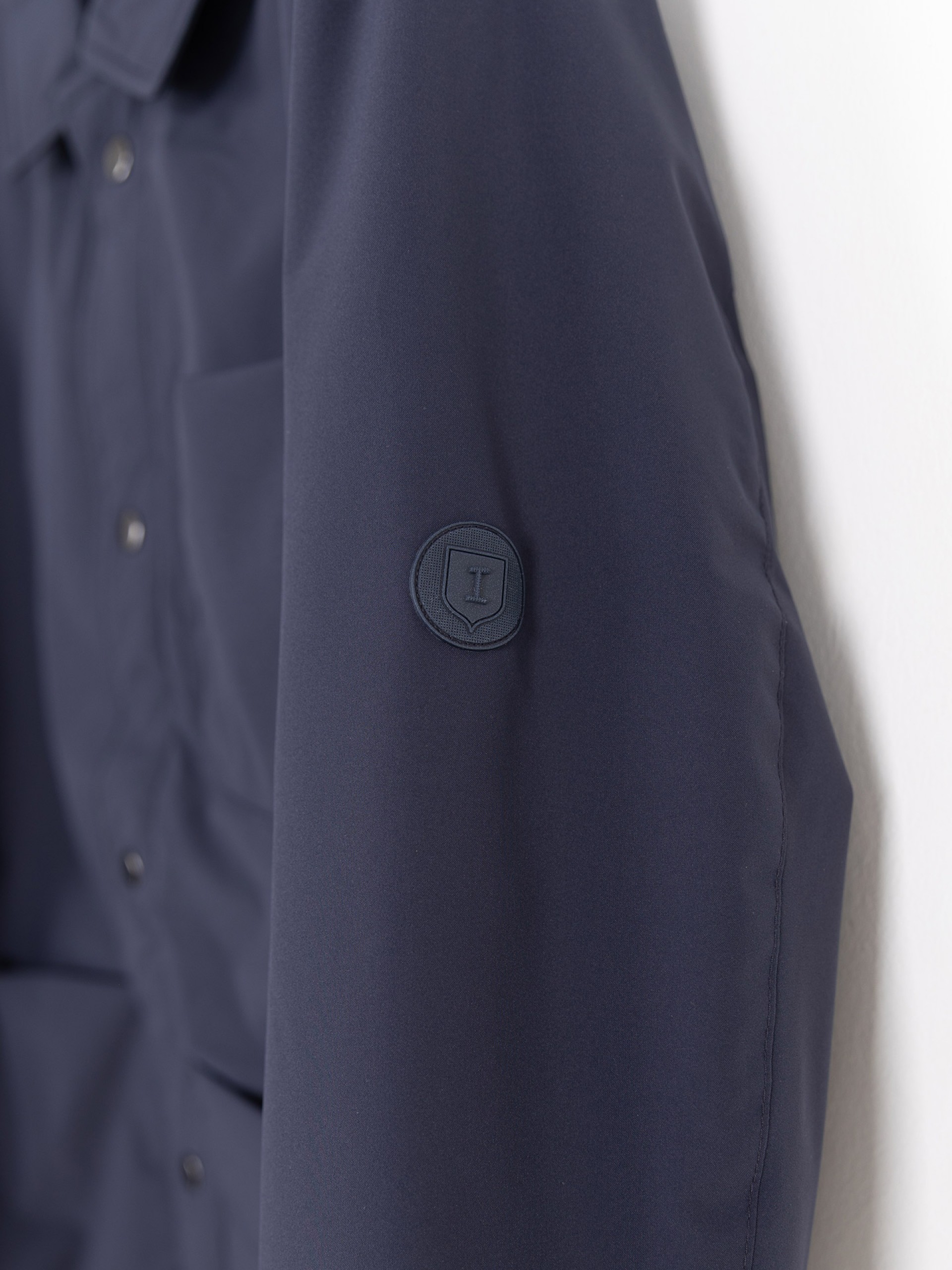 Technical jacket with patch pockets
