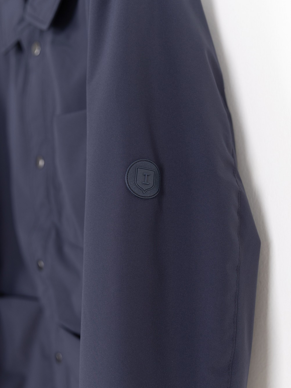 Technical jacket with patch pockets